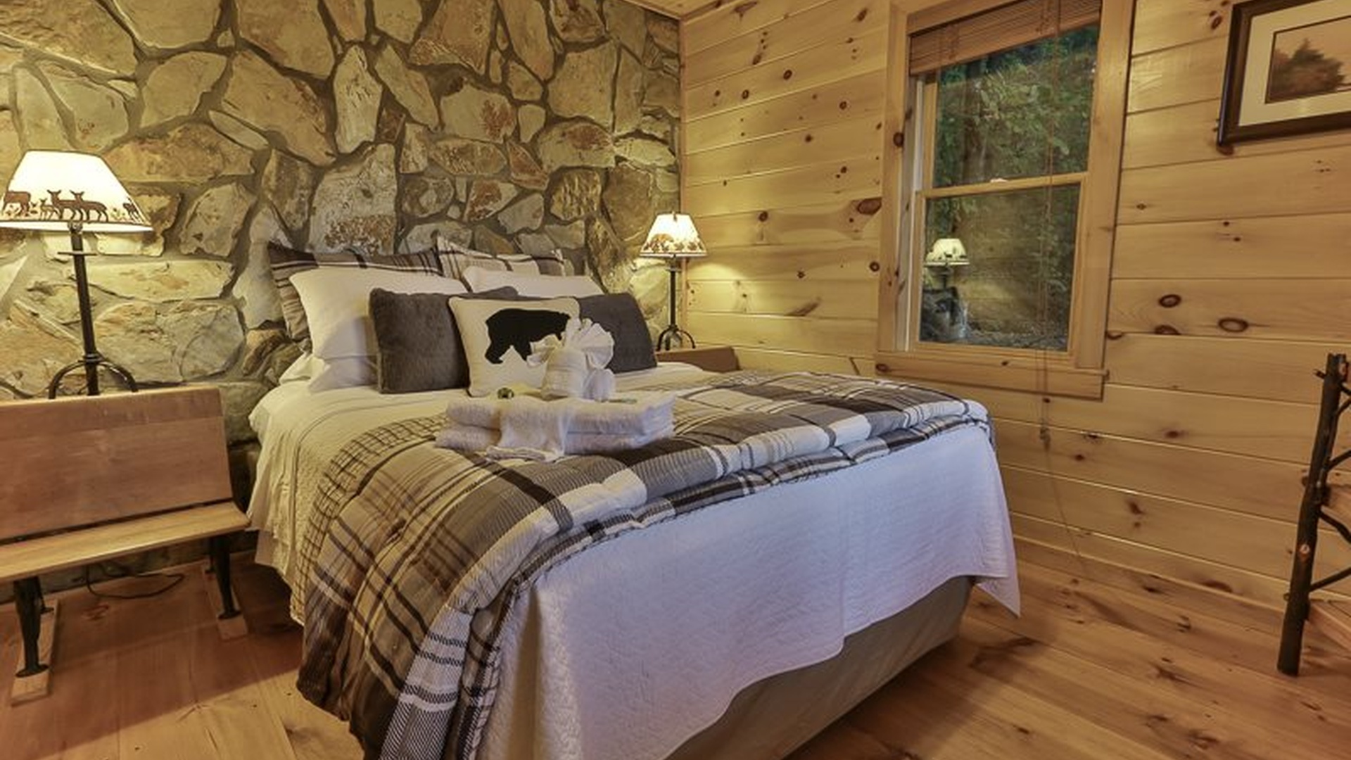 Lower queen suite with its own relaxed terrace-level feel.